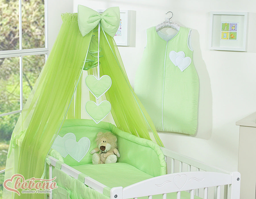 Large mosquito net for baby's bed made of chiffon with hanging hearts and a bow - green