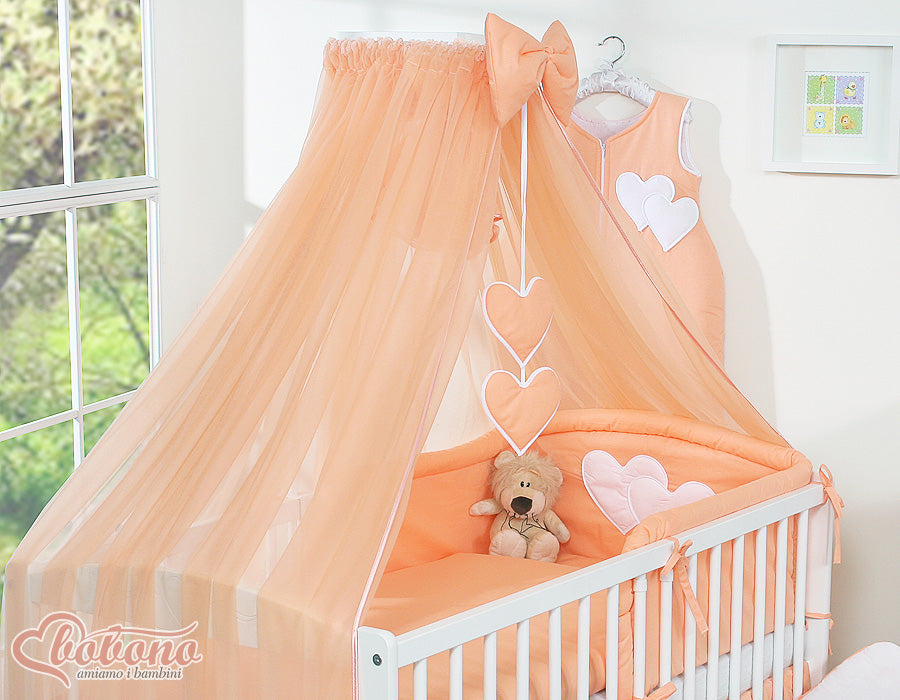 Large mosquito net for baby's bed made of chiffon with hanging hearts and a bow - peach