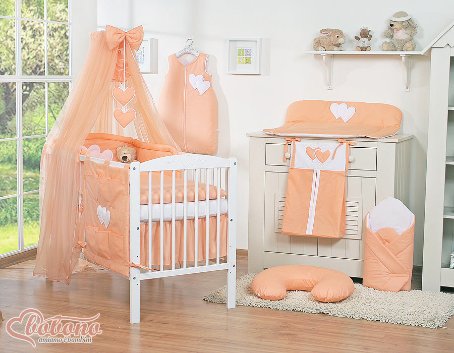 Large mosquito net for baby's bed made of chiffon with hanging hearts and a bow - peach
