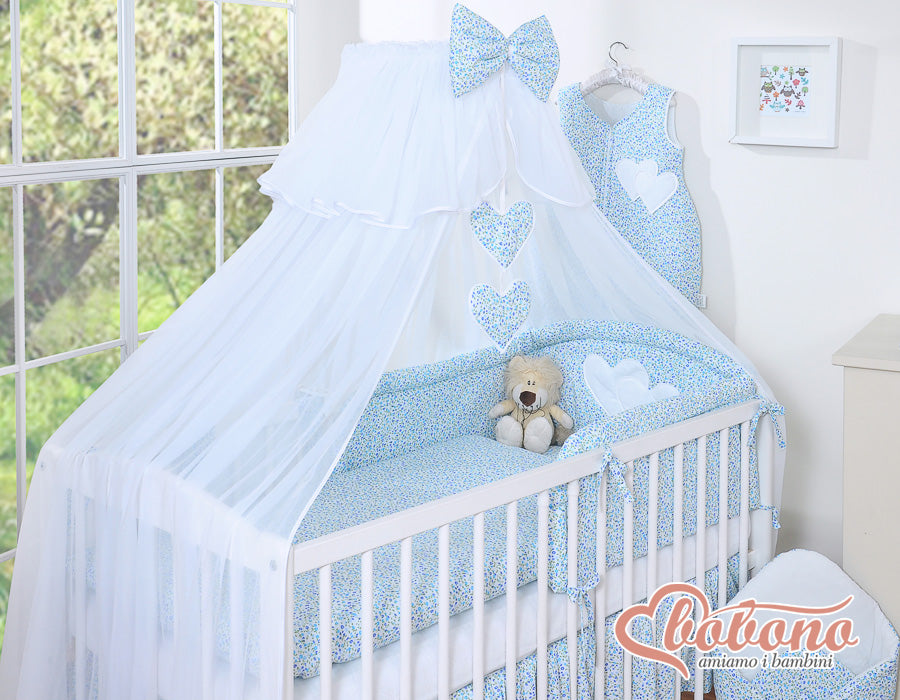 Large mosquito net for baby's bed made of white chiffon with hanging hearts and a bow - blue flowers