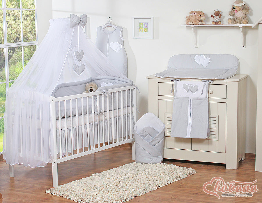 Large mosquito net for baby's bed made of white chiffon with hanging hearts and a bow - gray hangers