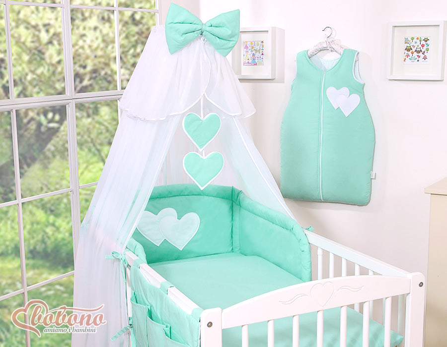 Large mosquito net for baby's bed made of white chiffon with hanging hearts and a bow - mint hangers