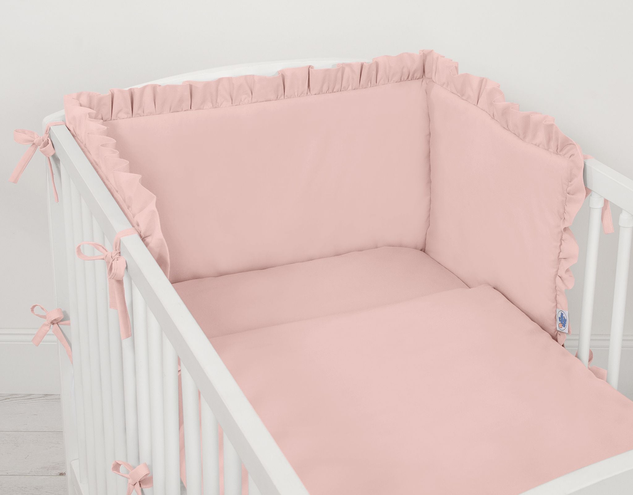 Universal baby bed bumper with frill - pastel pink