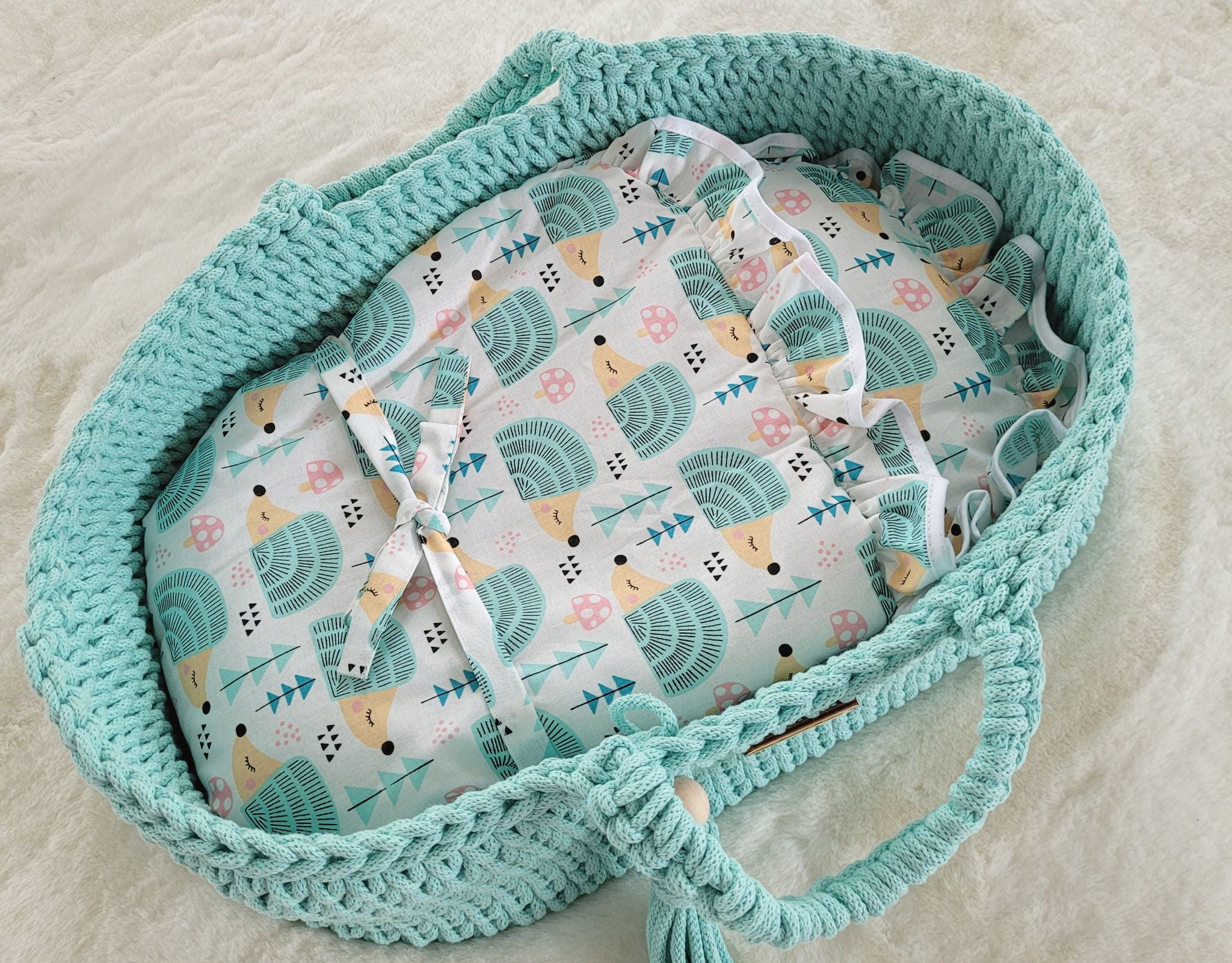 Baby doll swaddling blanket - hedgehogs mint