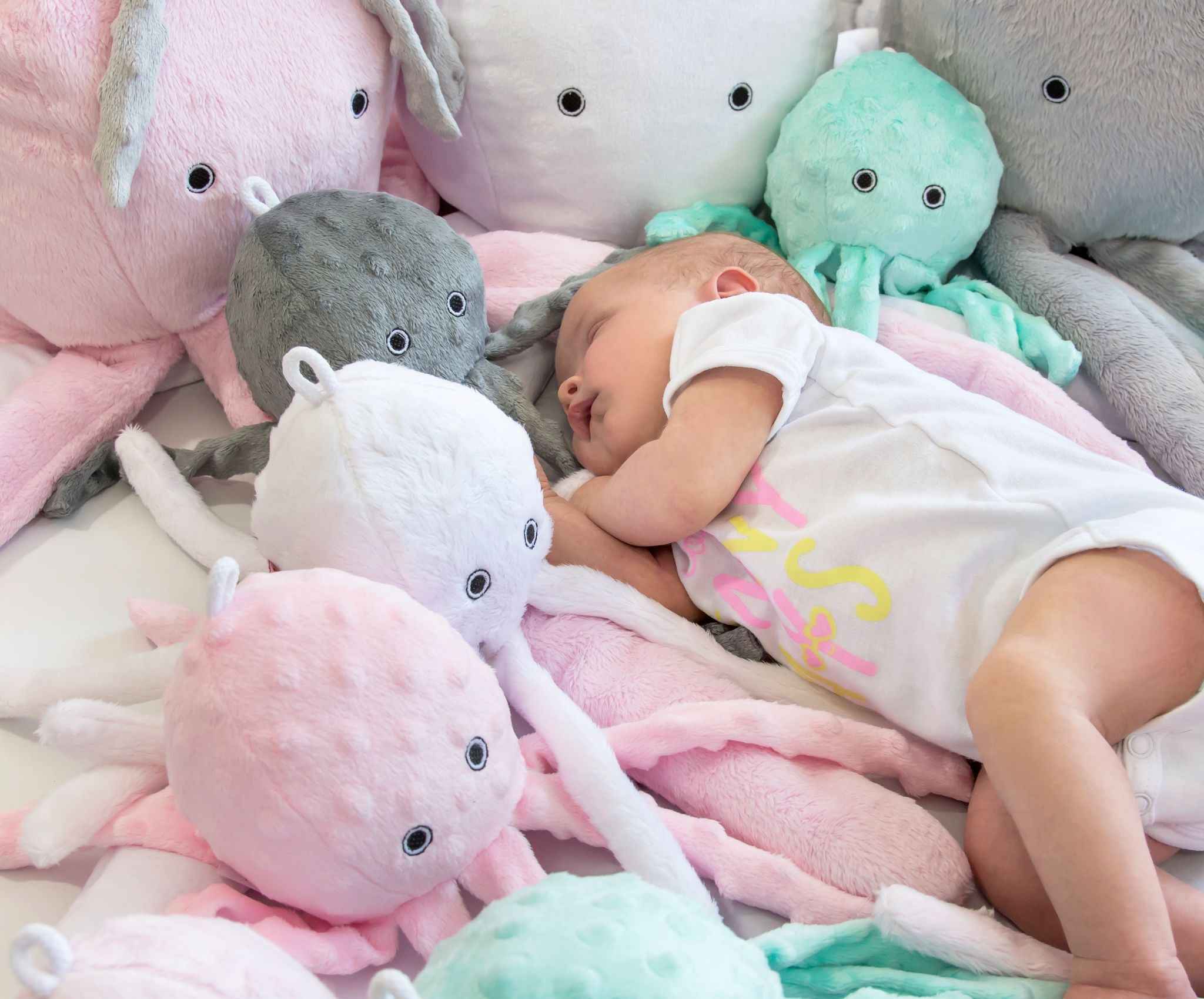 Cuddly octopus with rattle - Mint - polka dot minky