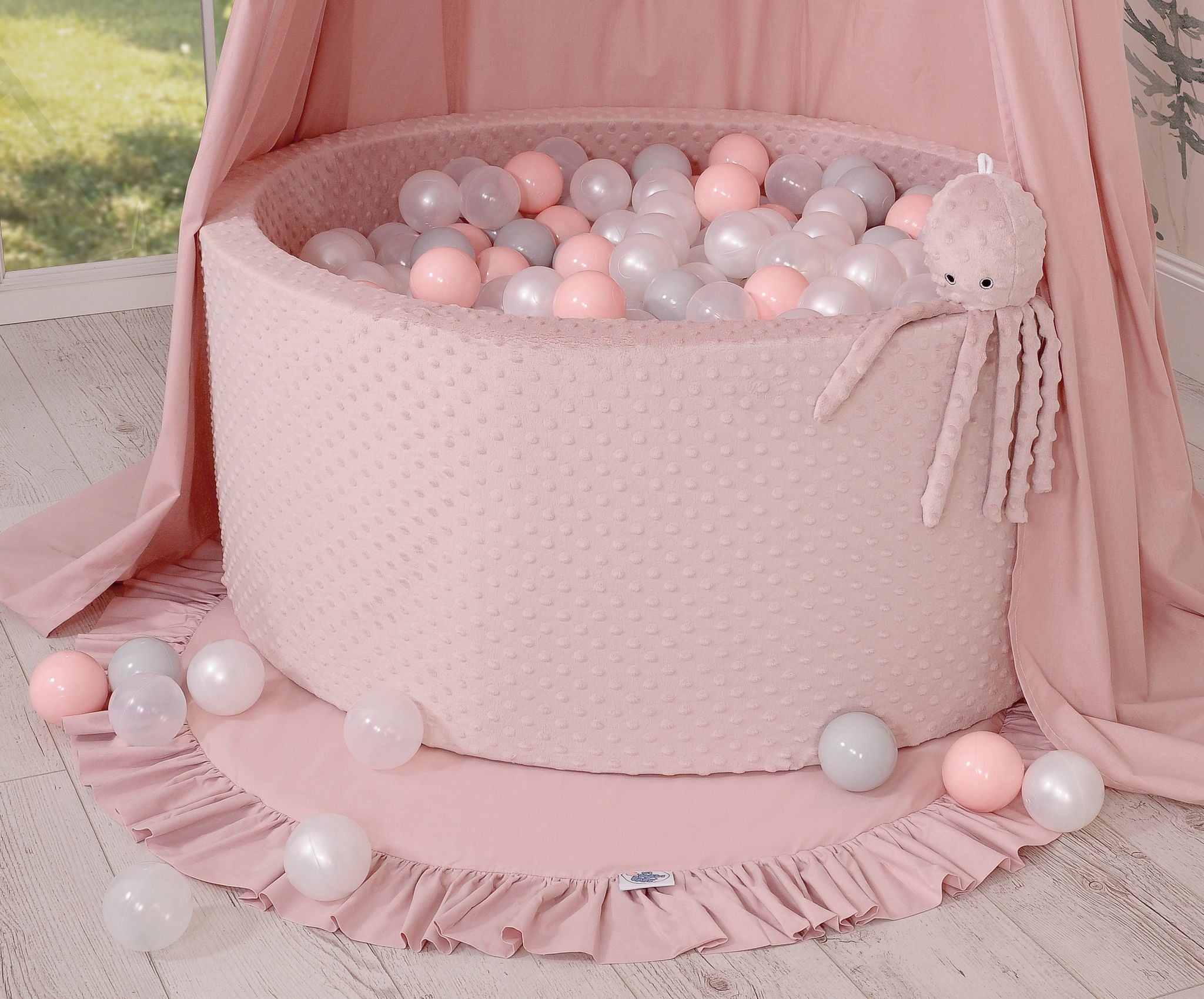 Cuddly octopus with rattle - pastel pink - polka dot minky