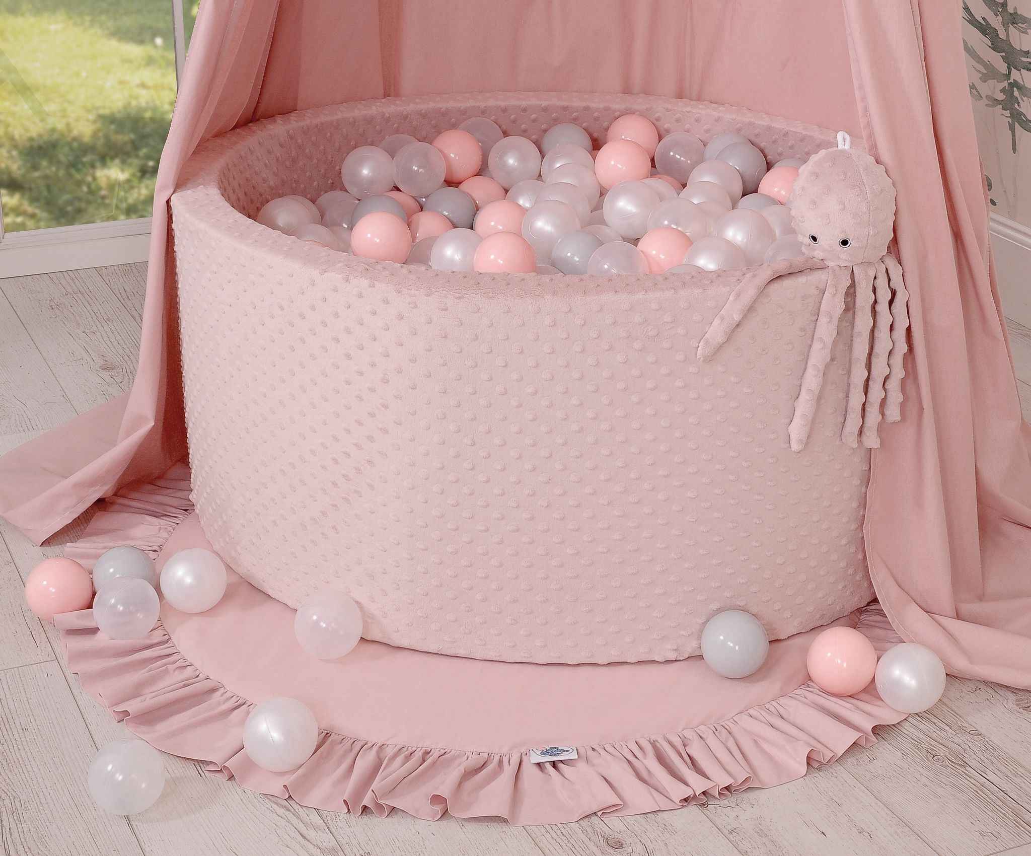 Cuddly octopus with rattle - pastel pink - polka dot minky