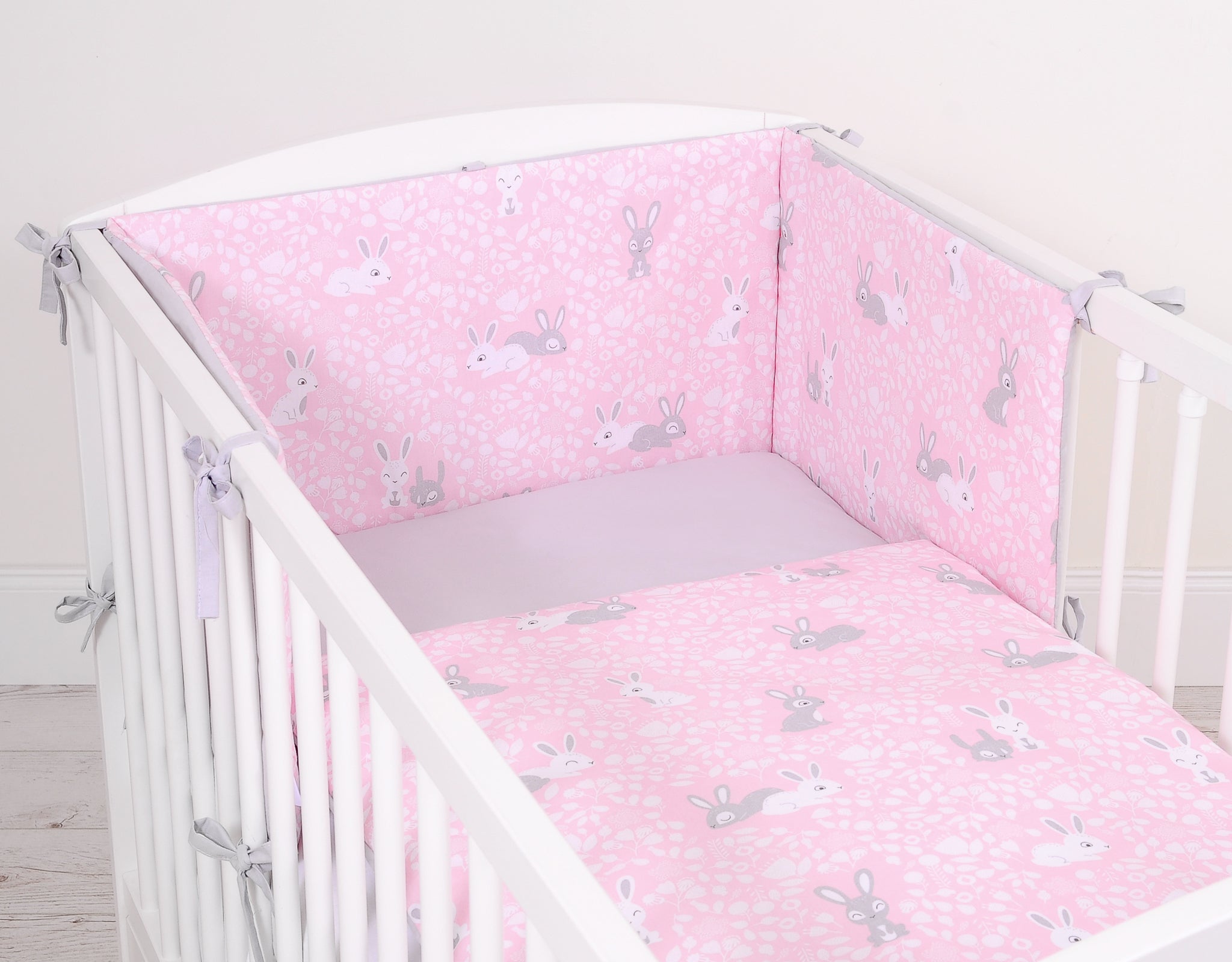 Universal double-sided bumper for cot - pink rabbits