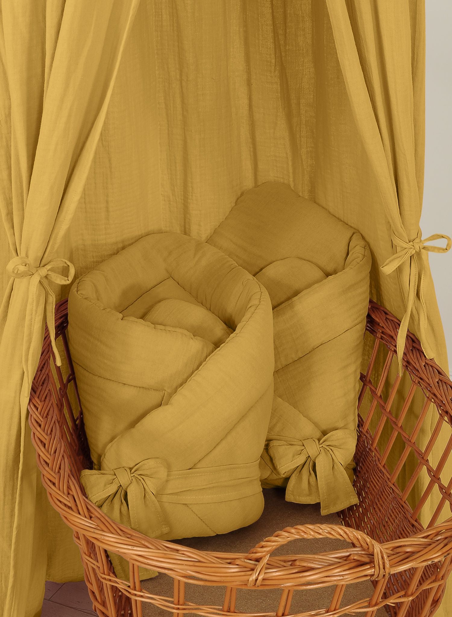 Muslin baby nest with bow - honey yellow