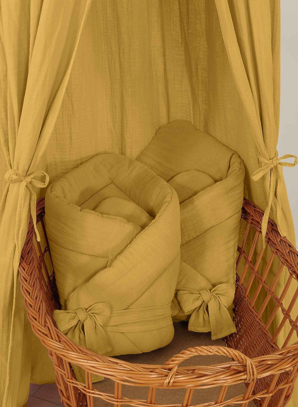 Muslin baby nest with bow - honey yellow