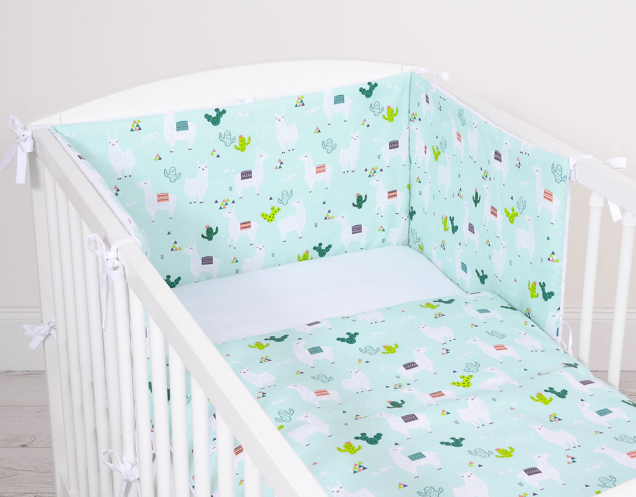 Universal double-sided bumper for cot - lama mint/white
