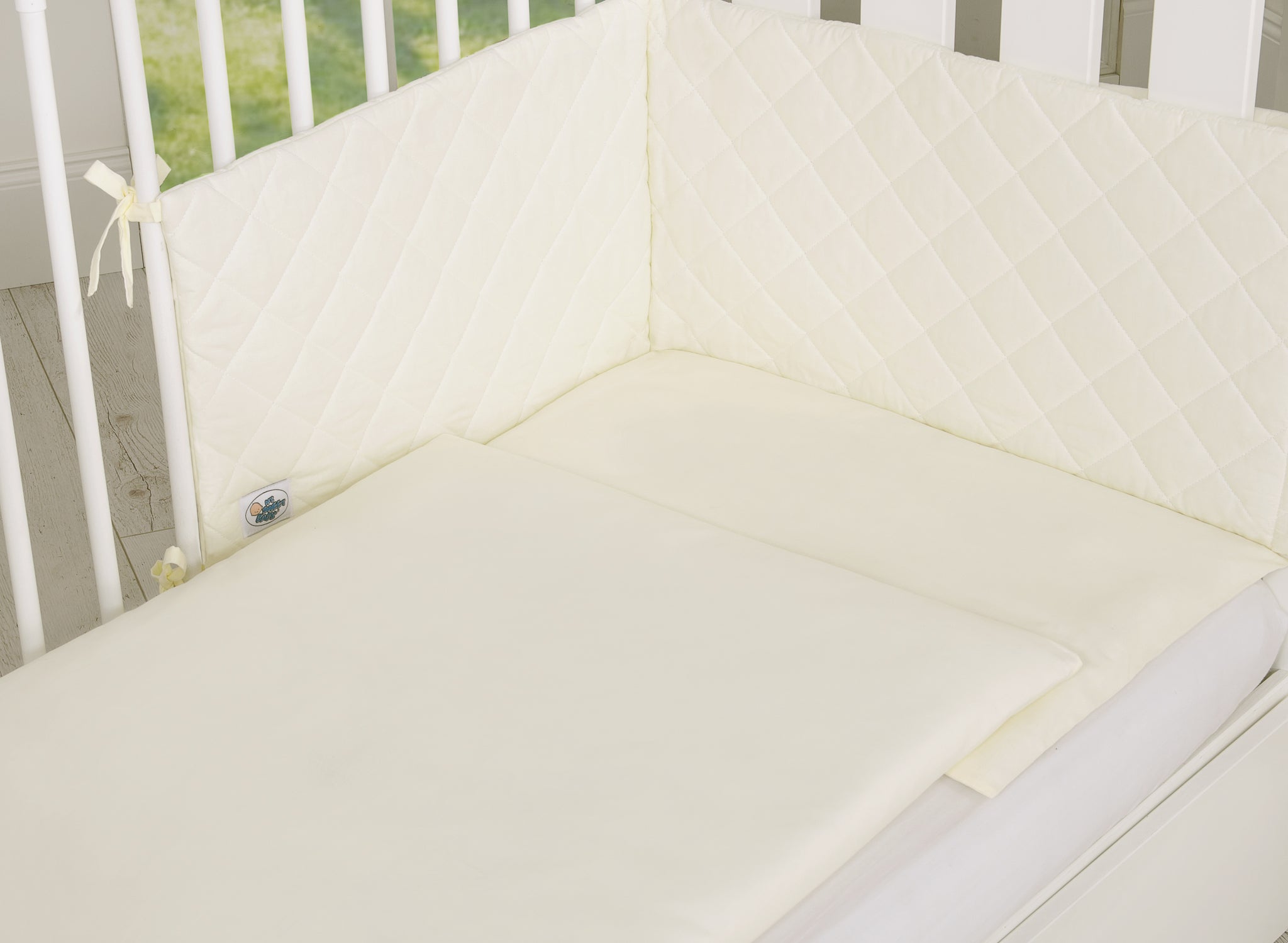 Universal bumper peaked - cream